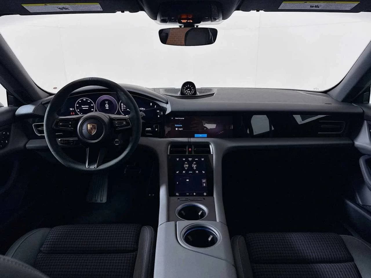 Porsche Taycan 4 AWD 2025 — side view