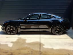 Porsche Taycan 4 Black Edition AWD 2026 — side view