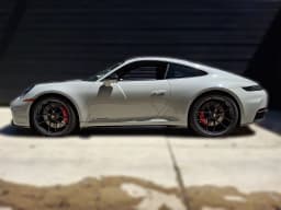 Porsche 911 Carrera 4 GTS Coupe 2026 — side view