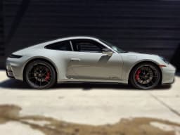 Porsche 911 Carrera 4 GTS Coupe 2026 — side view