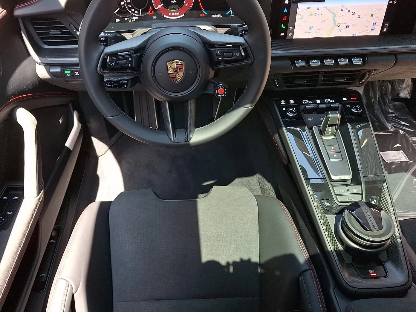 Porsche 911 Carrera 4 GTS Coupe 2026 — side view