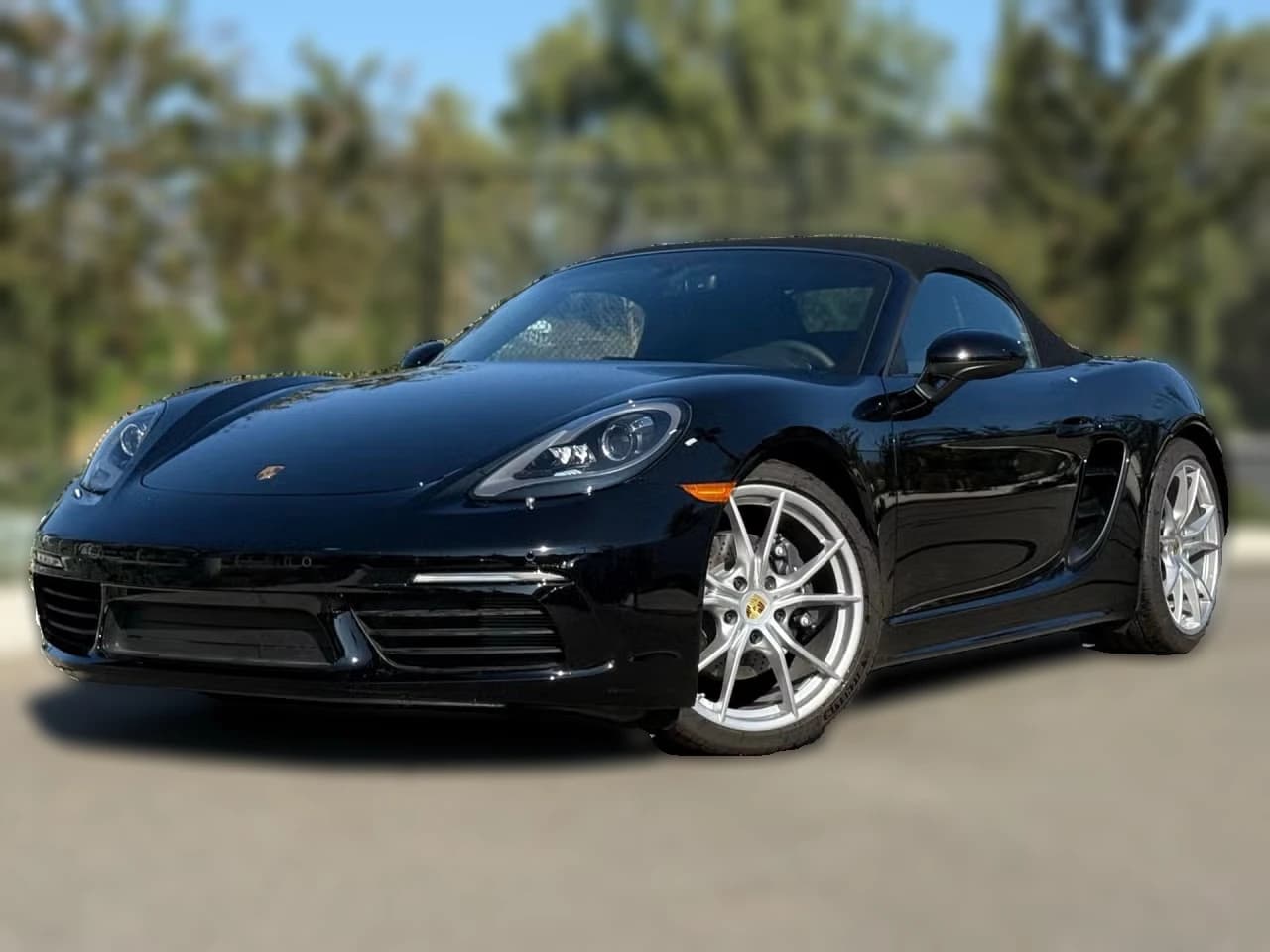 Porsche 718 Boxster Base Roadster 2025 — side view