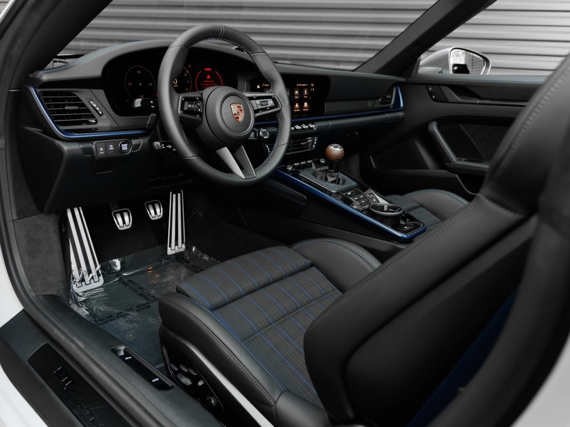 Porsche 911 Carrera T Cabriolet 2026 — side view