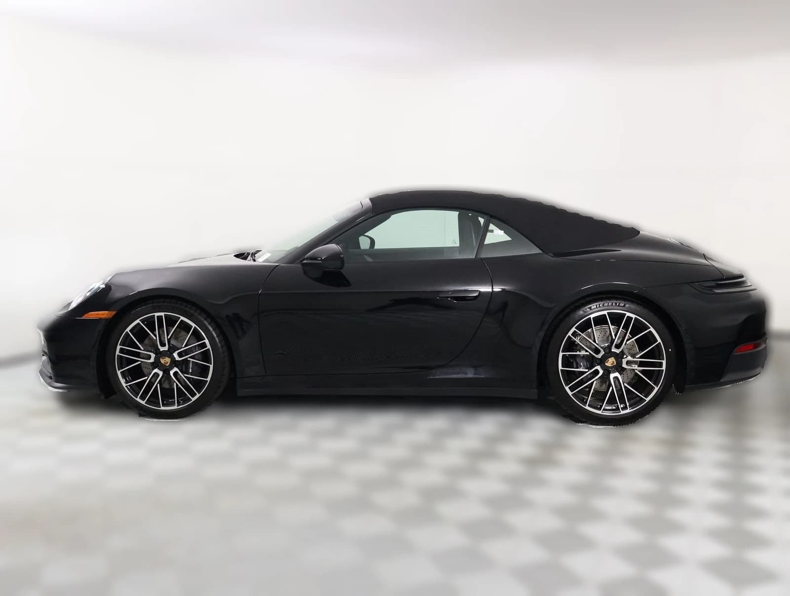 Porsche 911 Carrera Cabriolet 2026 — side view