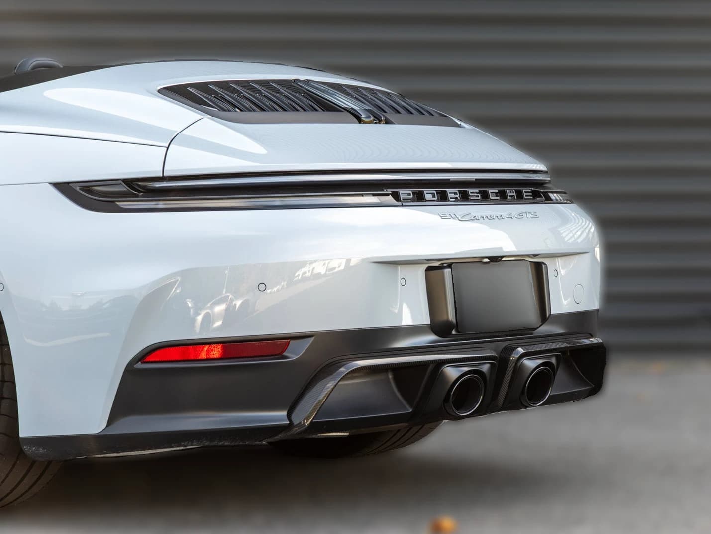 Porsche 911 Carrera 4 GTS Cabriolet 2026 — side view