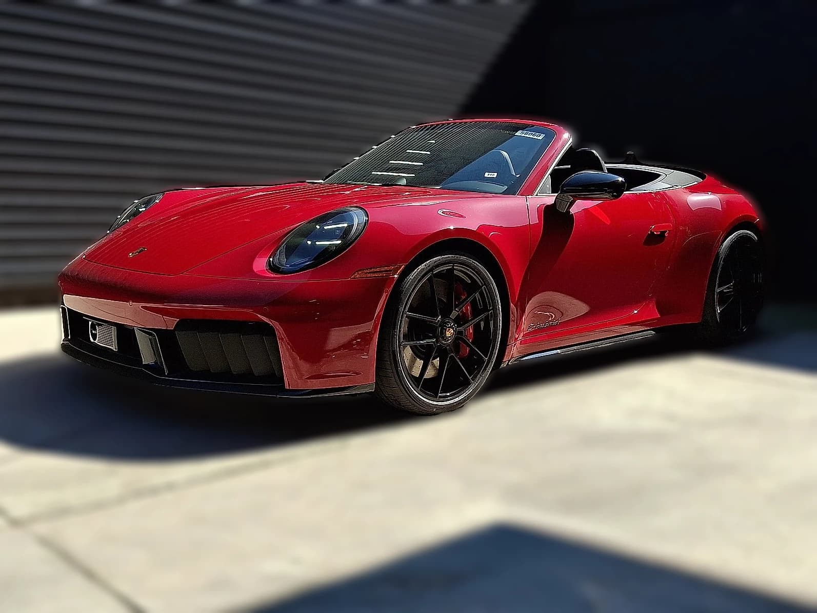 Porsche 911 Carrera 4 GTS Cabriolet 2026 — side view
