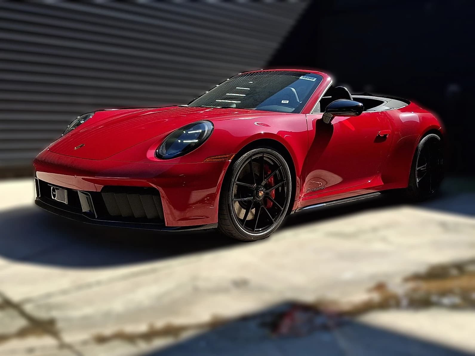Porsche 911 Carrera 4 GTS Cabriolet 2026 — side view