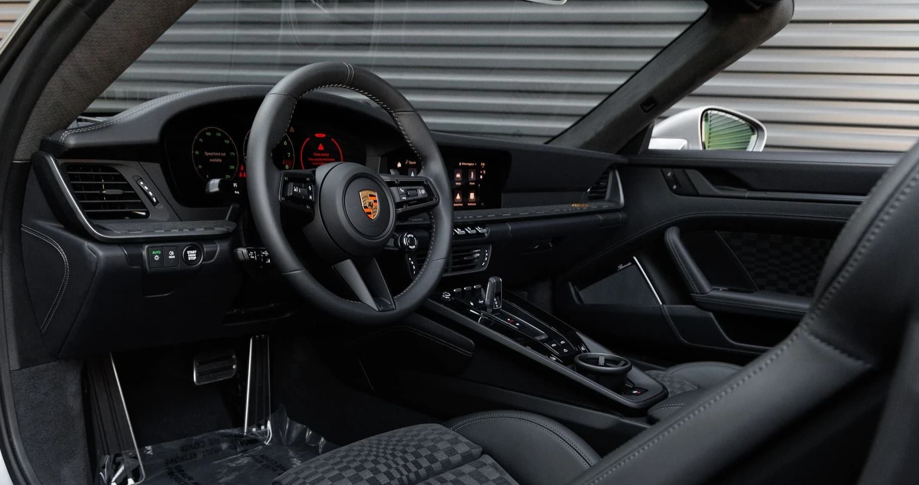 Porsche 911 Carrera 4 GTS Cabriolet 2026 — side view