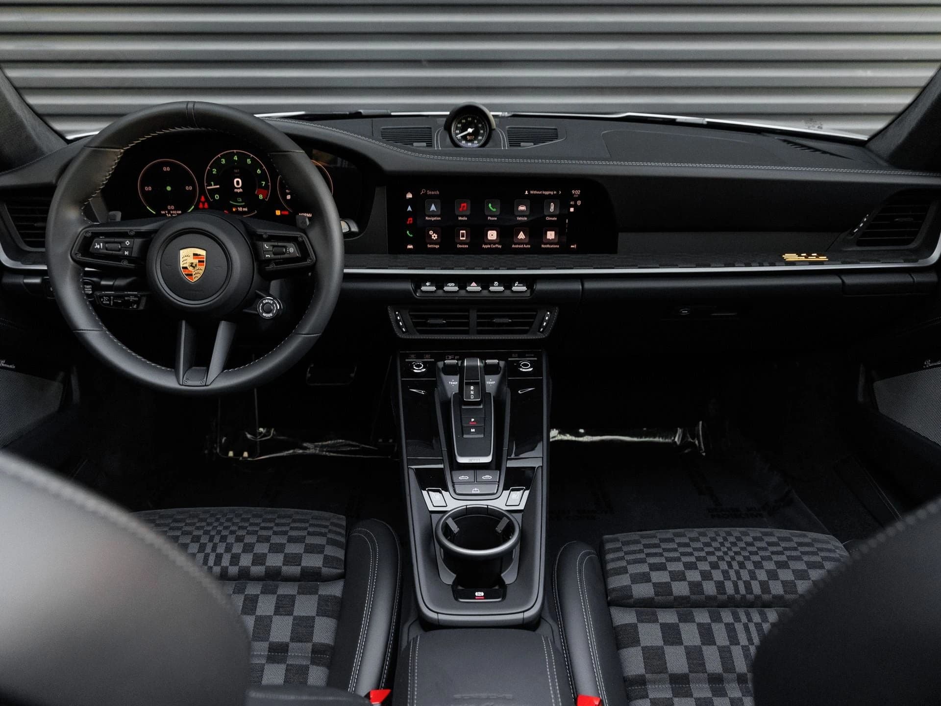 Porsche 911 Carrera 4 GTS Cabriolet 2026 — side view