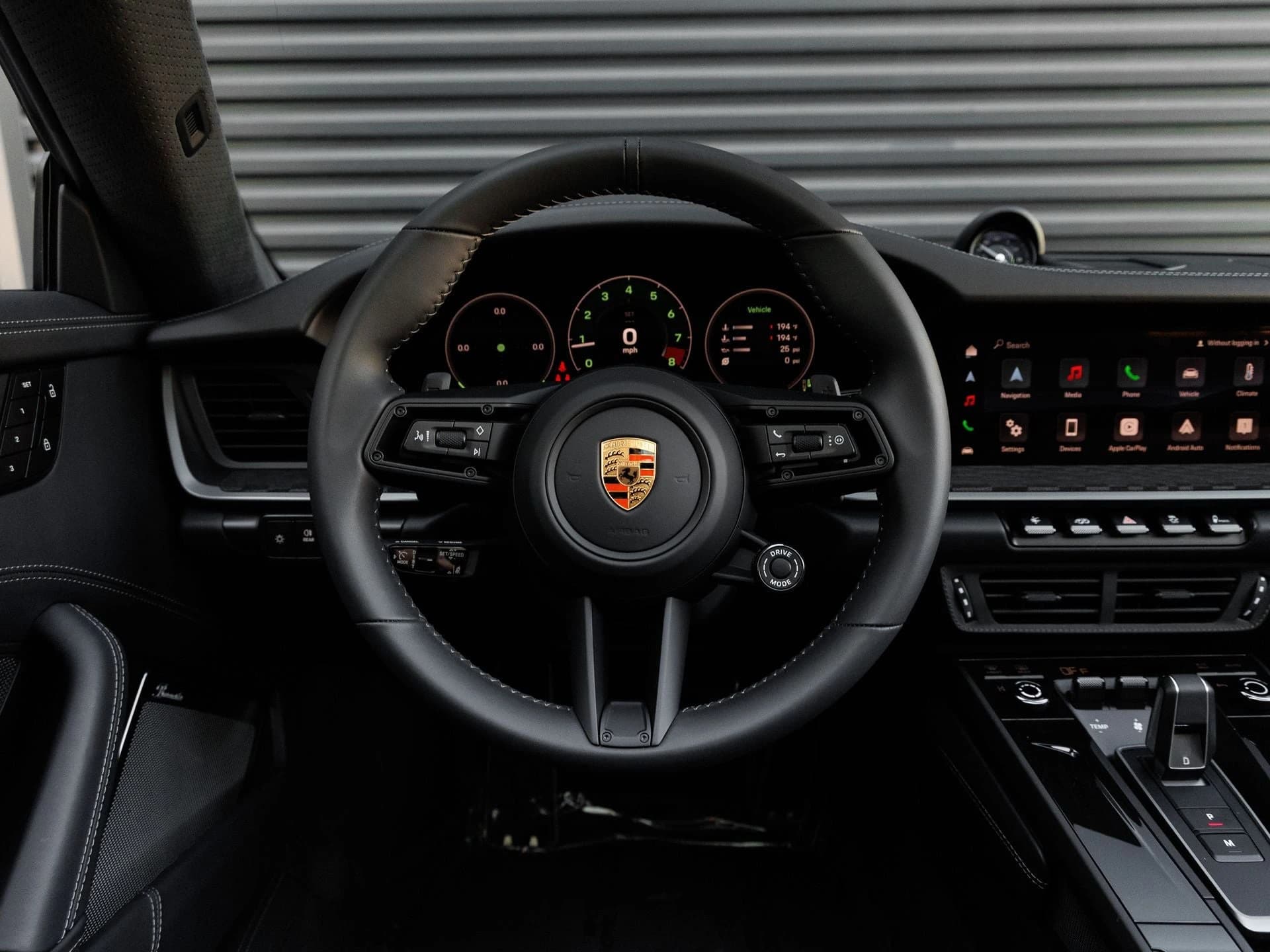 Porsche 911 Carrera 4 GTS Cabriolet 2026 — side view