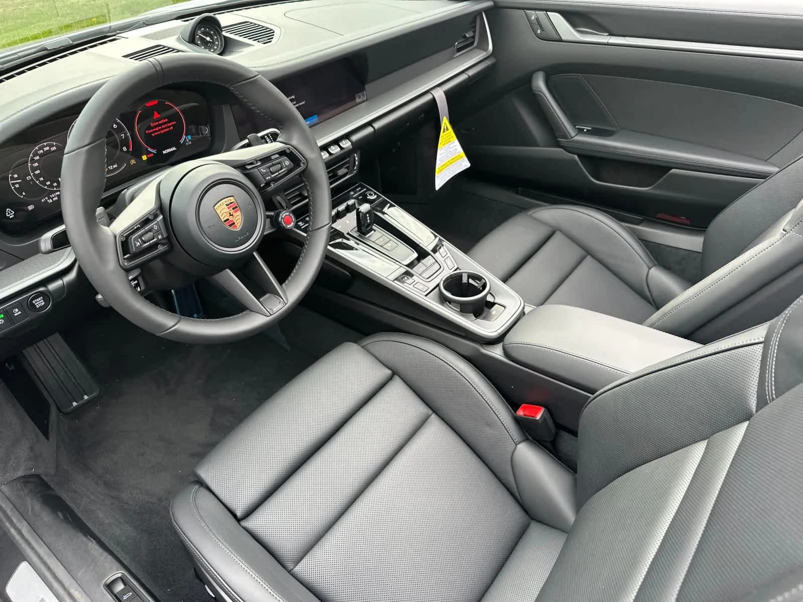Porsche 911 Carrera 4S Cabriolet 2026 — side view