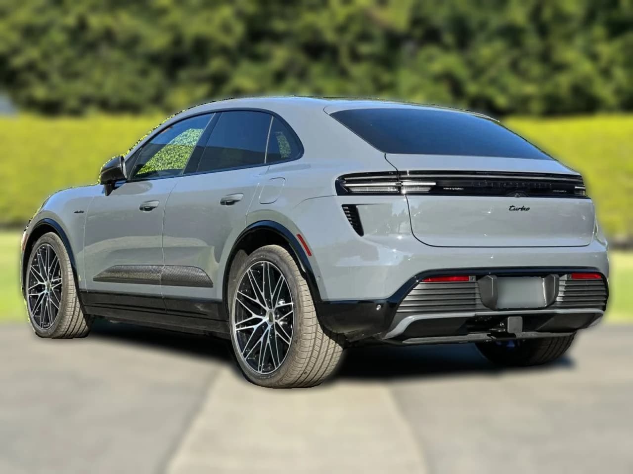 Porsche Macan Electric Turbo AWD 2025 — side view