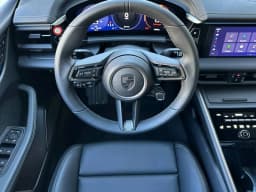 Porsche Macan Electric Turbo AWD 2025 — side view