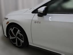 Volkswagen Golf GTI SE 2.0T DSG 2026 — side view