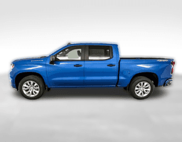 Chevrolet Silverado 1500 4WD Crew Cab 147" Custom 2025 — side view