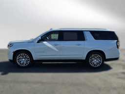 Chevrolet Suburban 4WD 4dr High Country 2024 — side view