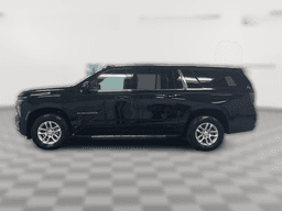 Chevrolet Suburban 4WD 4dr LS 2025 — side view