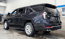 Chevrolet Suburban 4WD 4dr Premier 2025 — rear view