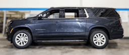 Chevrolet Suburban 4WD 4dr Premier 2025 — side view