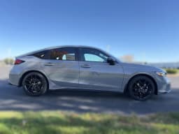 Honda Civic Hatchback Hybrid Sport CVT 2026 — side view