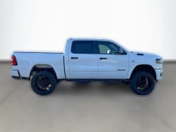 Ram 1500 Big Horn 4x4 Crew Cab 5'7" Box 2026 — side view