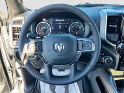 Ram 1500 Big Horn 4x4 Crew Cab 5'7" Box 2026 — side view