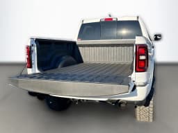 Ram 1500 Big Horn 4x4 Crew Cab 5'7" Box 2026 — side view