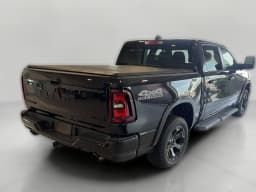 Ram 1500 Big Horn 4x4 Crew Cab 5'7" Box 2026 — side view