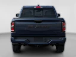 Ram 1500 Express 4x4 Crew Cab 5'7" Box 2026 — side view