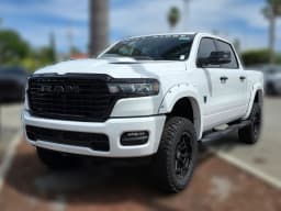 Ram 1500 Laramie 4x4 Crew Cab 5'7" Box 2026 — side view