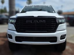 Ram 1500 Laramie 4x4 Crew Cab 5'7" Box 2026 — side view