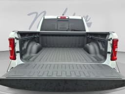 Ram 1500 Laramie 4x4 Crew Cab 5'7" Box 2026 — side view