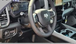 Ram 1500 Laramie 4x4 Crew Cab 5'7" Box 2026 — side view