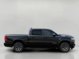 Ram 1500 Laramie 4x4 Crew Cab 5'7" Box 2026 — side view