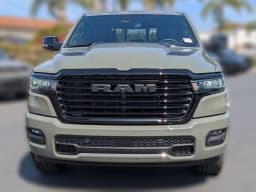 Ram 1500 Laramie 4x4 Crew Cab 5'7" Box 2026 — side view