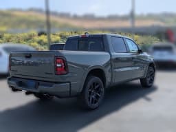 Ram 1500 Laramie 4x4 Crew Cab 5'7" Box 2026 — side view