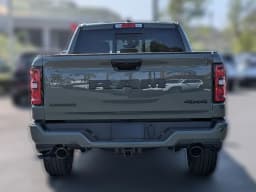 Ram 1500 Laramie 4x4 Crew Cab 5'7" Box 2026 — side view