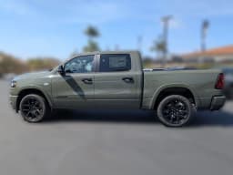Ram 1500 Laramie 4x4 Crew Cab 5'7" Box 2026 — side view