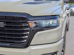 Ram 1500 Laramie 4x4 Crew Cab 5'7" Box 2026 — side view