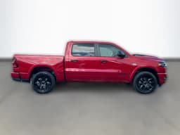 Ram 1500 Laramie 4x4 Crew Cab 5'7" Box 2026 — side view