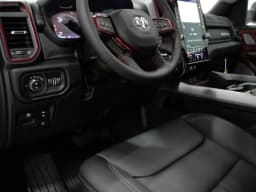 Ram 1500 Rebel 4x4 Crew Cab 5'7" Box 2027 — side view