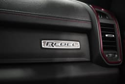 Ram 1500 Rebel 4x4 Crew Cab 5'7" Box 2027 — side view