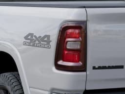 Ram 1500 Laramie 4x4 Crew Cab 6'4" Box 2026 — side view