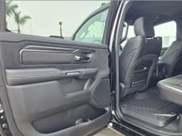 Ram 1500 RHO 4x4 Crew Cab 5'7" Box 2026 — side view