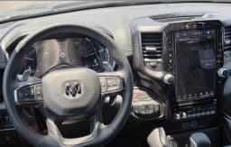 Ram 1500 RHO 4x4 Crew Cab 5'7" Box 2026 — side view