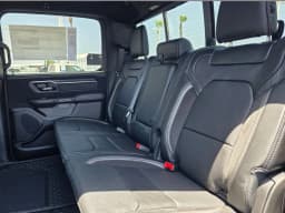 Ram 1500 RHO 4x4 Crew Cab 5'7" Box 2026 — side view