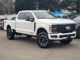 Ford Super Duty F-350 SRW Platinum 4WD Crew Cab 6.75' Box 2027 — side view