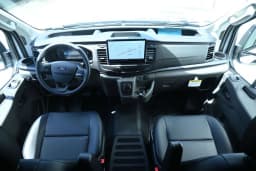 Ford E-Transit Cargo Van Base T-350 148" Hi Rf 9500 GVWR RWD 2026 — side view