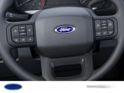 Ford Super Duty F-350 SRW XL 4WD Reg Cab 8' Box 2027 — side view