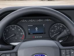 Ford Super Duty F-350 SRW XLT 4WD Reg Cab 8' Box 2027 — side view